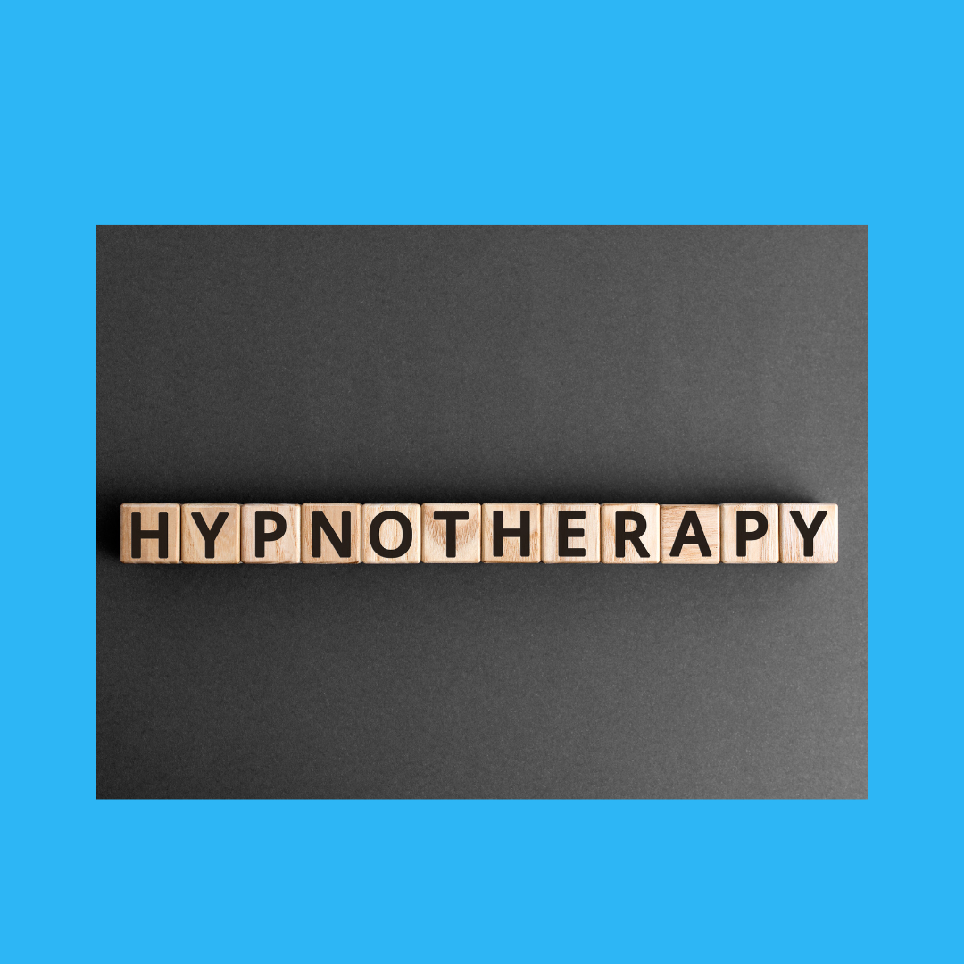 hypnotherapy spelled out in scrabble tile on a blue